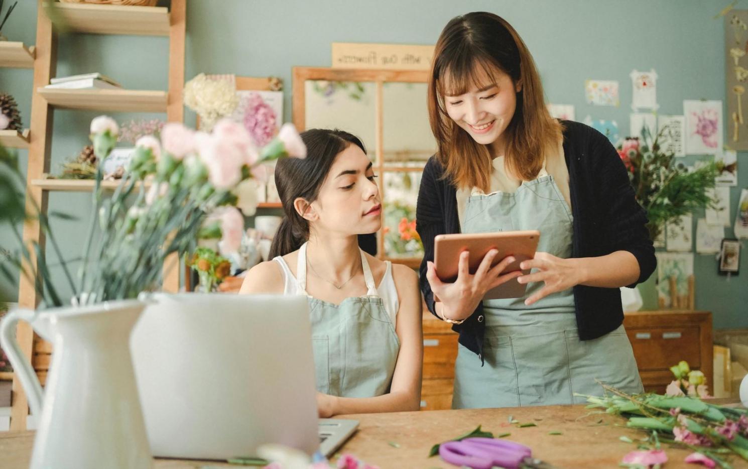 Professional seasonal floral arrangement showcasing autumn elements with rich textures and natural composition